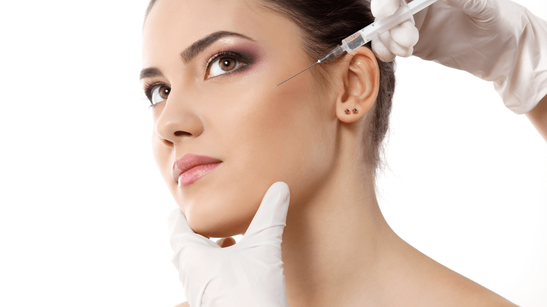 woman receiving facial injecti